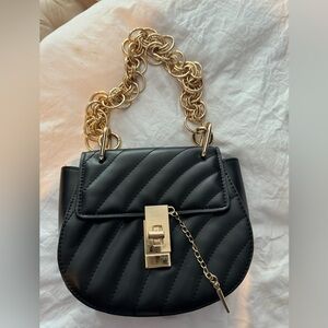 Black and gold shoulder bag